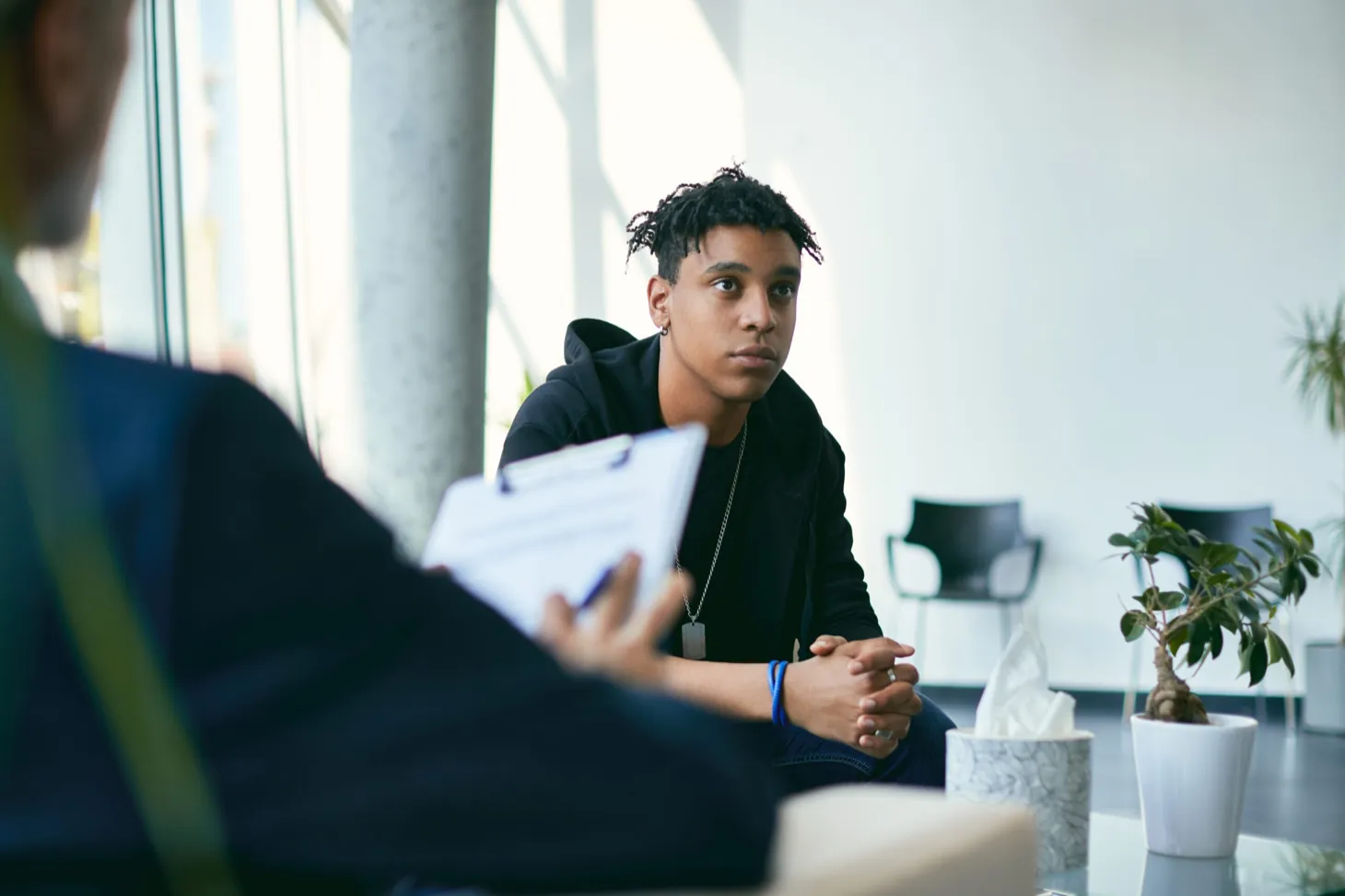 Teen taking part in a structured intensive outpatient session at Ethos Wellness