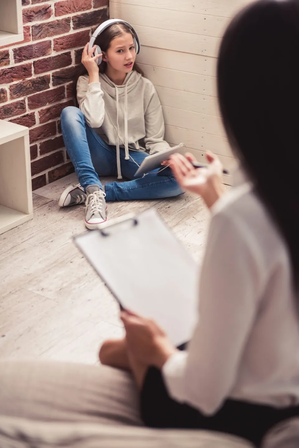 Teen and parent meeting with an Ethos Wellness psychiatrist for collaborative care