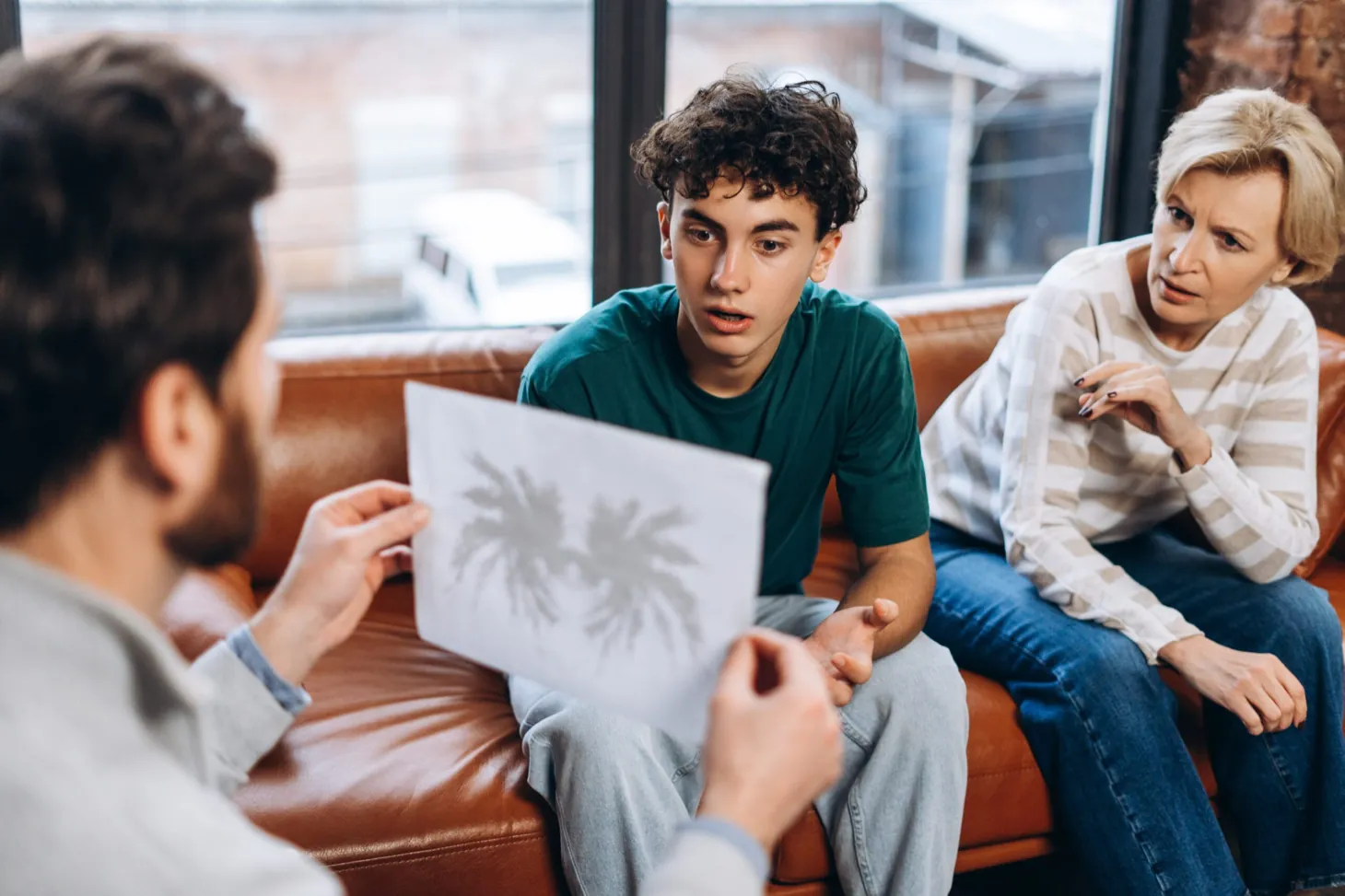 Teen meeting with a board-certified psychiatrist at Ethos Wellness