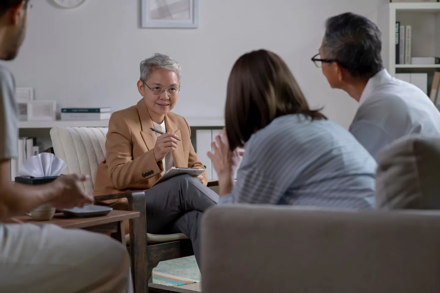 Adults in a structured intensive outpatient therapy group at Ethos Wellness