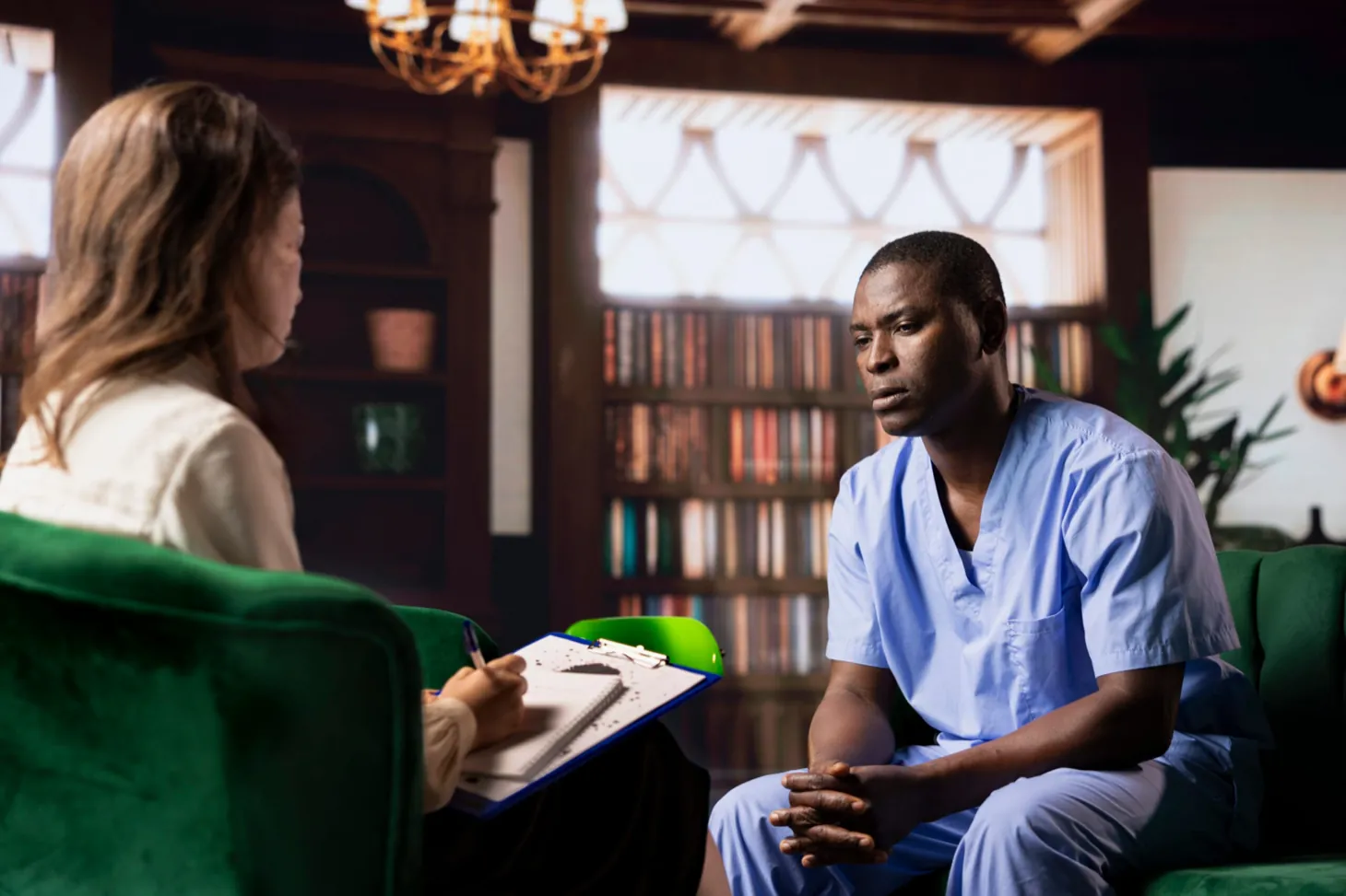 Adult meeting with a board-certified psychiatrist at Ethos Wellness