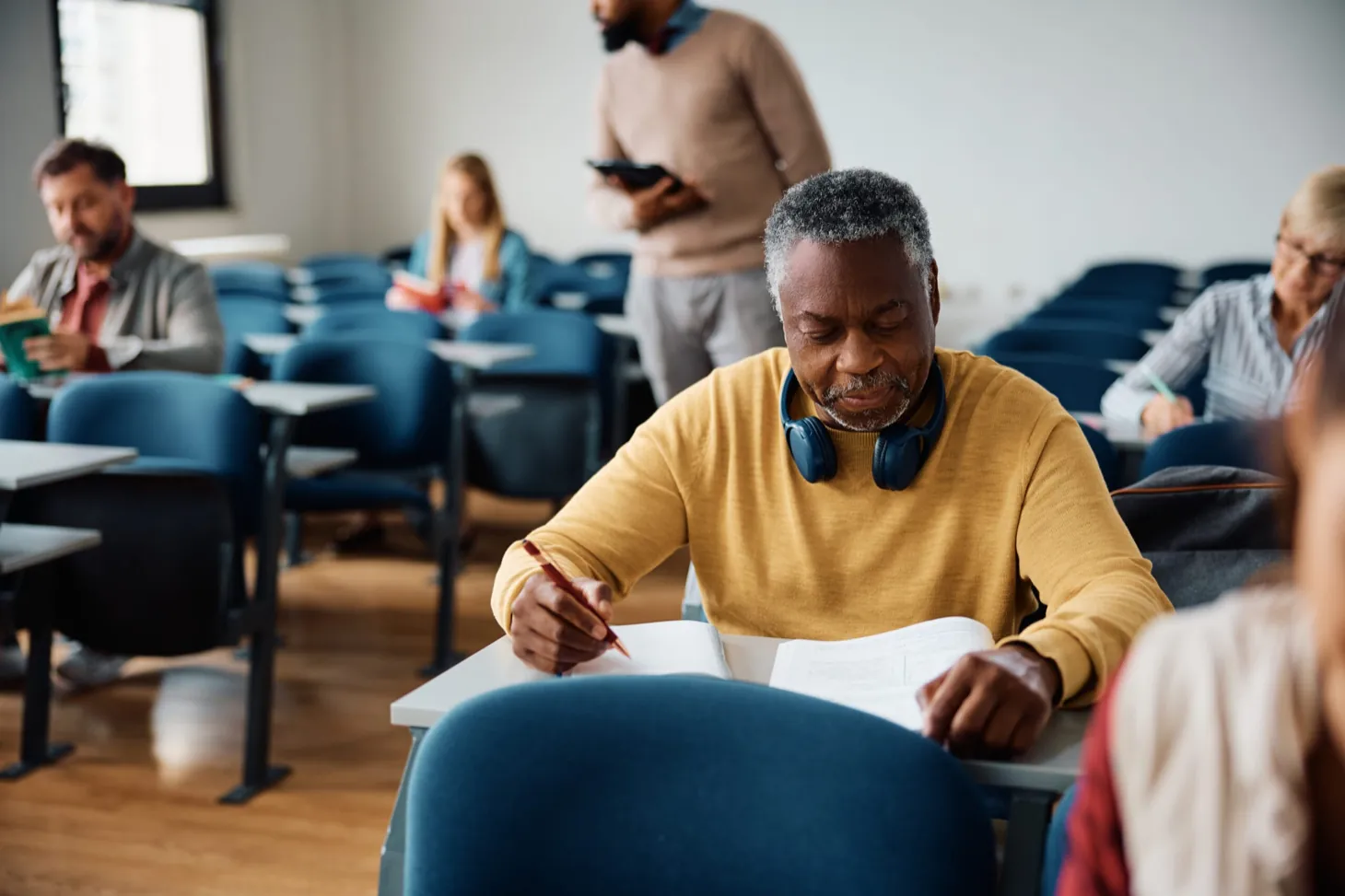 Adult reviewing psychoeducational testing results with a clinician at Ethos Wellness
