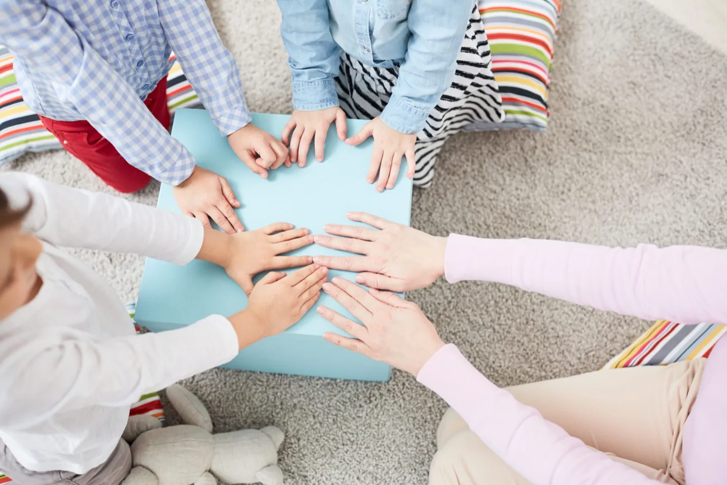 Children practicing social skills together during a group session at Ethos Wellness