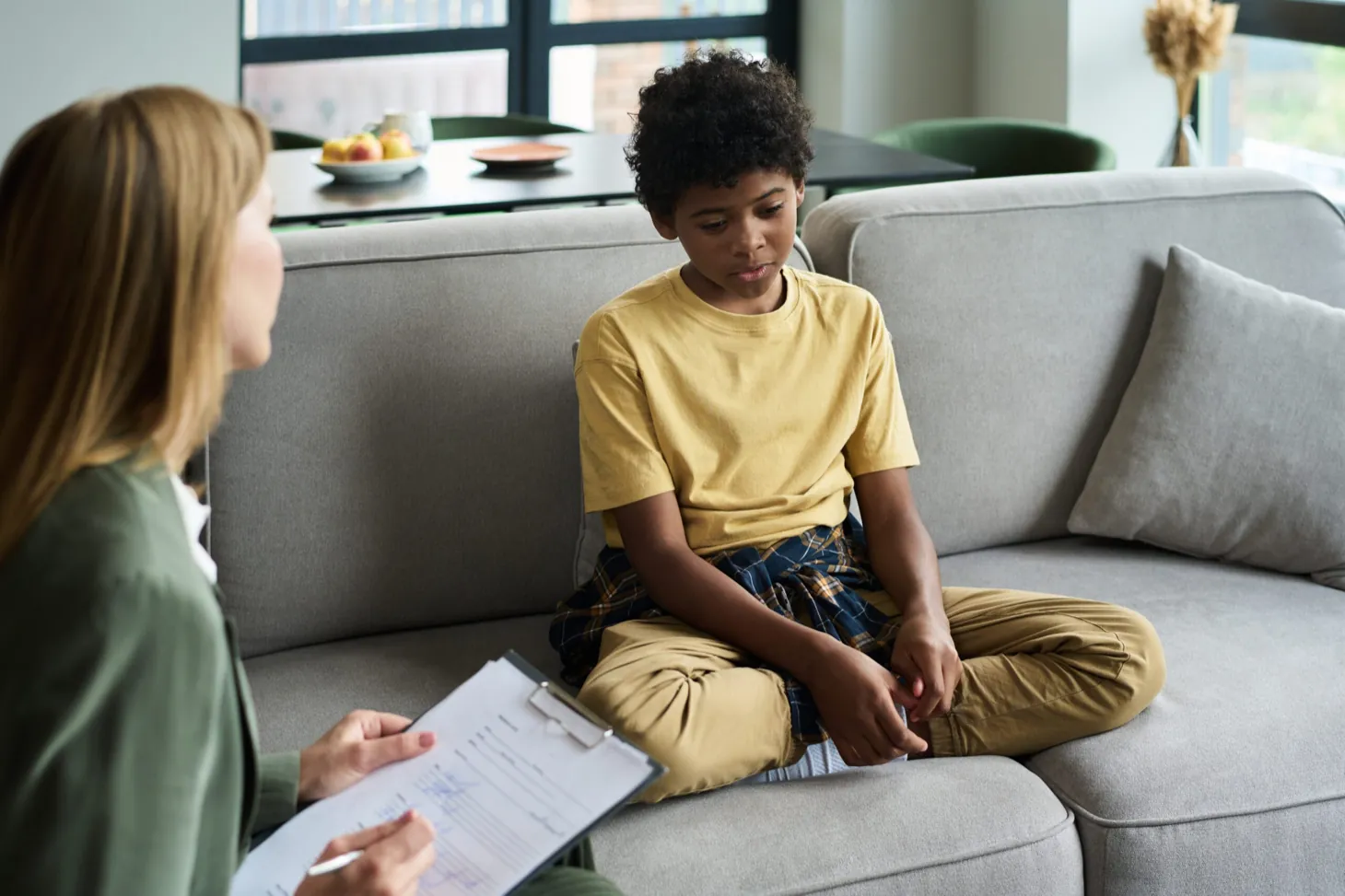 Child receiving structured outpatient support during a counseling session at Ethos Wellness
