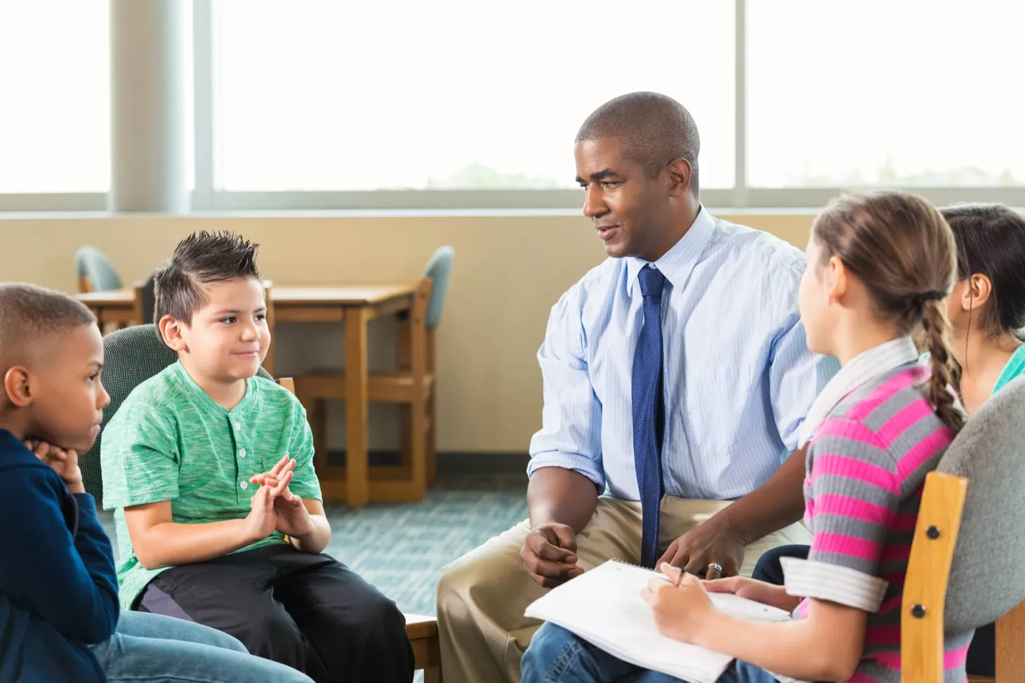 Child engaged in a play-based therapy session with a clinician at Ethos Wellness